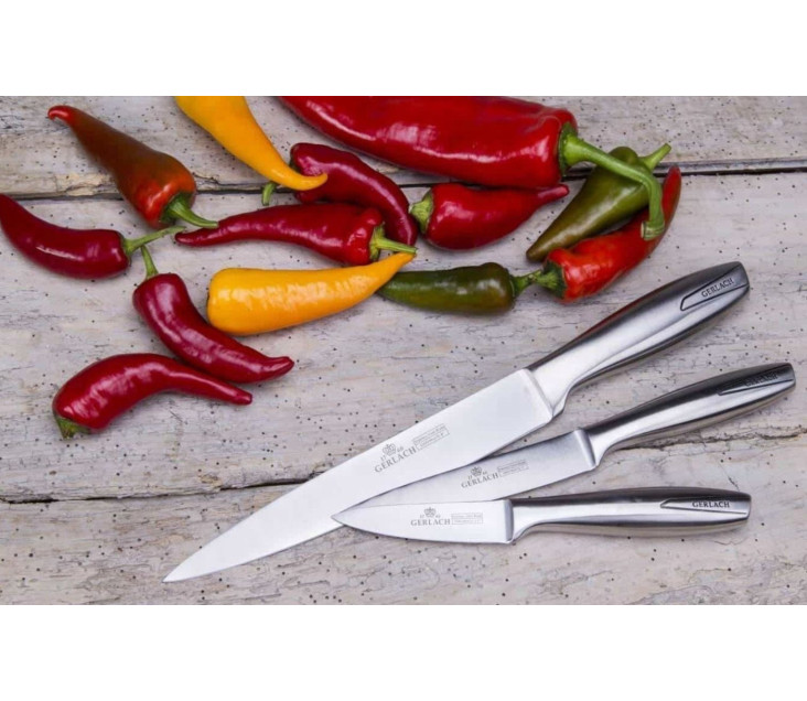 Zestaw noży w bloku białym...