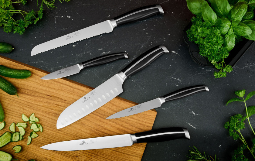 Zestaw sztućców dla 12 osób MUZA w walizce + zestaw noży w bloku LOFT